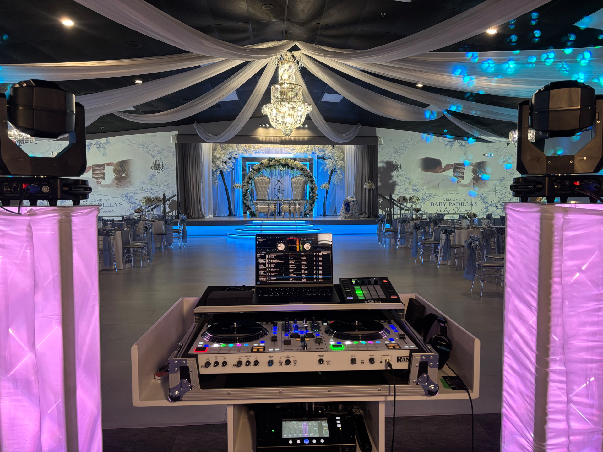 DJ Yera Events ballroom setup with chandelier and intelligent lighting