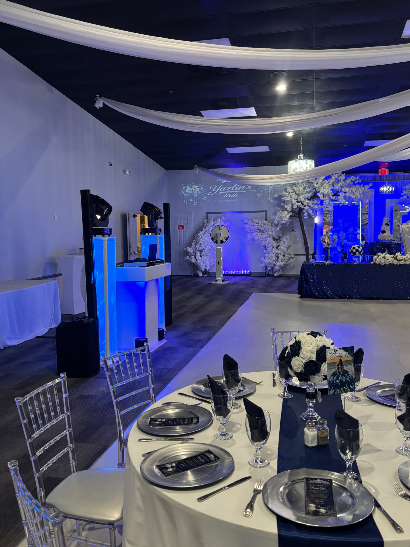 Quinceañera dance floor with DJ Yera lighting setup